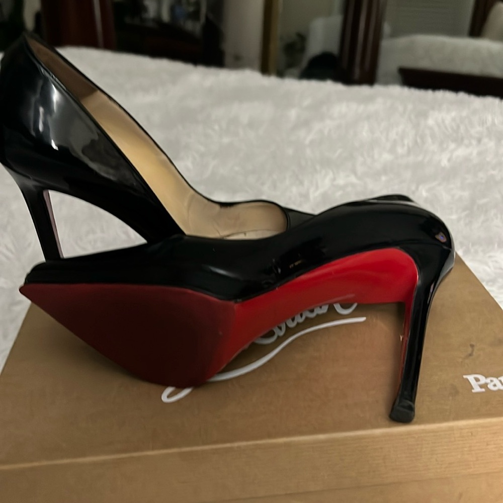 Christian shoes . I’m reposhing ,With box.